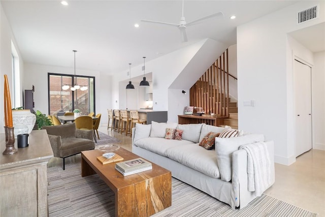 3008 Sorin St, Austin, TX 78723 - living room featuring stairway, a chandelier, recessed lighting, a ceiling fan, and baseboards