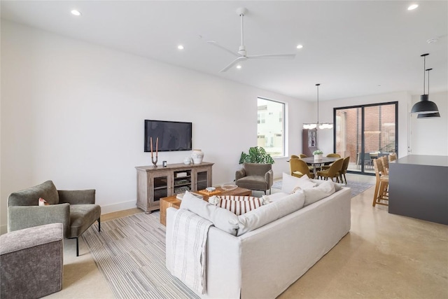 3008 Sorin St, Austin, TX 78723 - living area featuring recessed lighting, a ceiling fan, concrete flooring, and baseboards