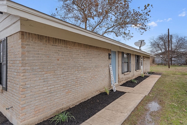 view of property exterior featuring a yard