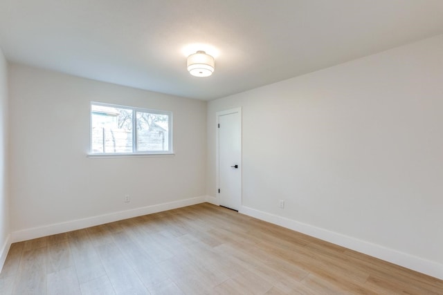 unfurnished room featuring light hardwood / wood-style floors