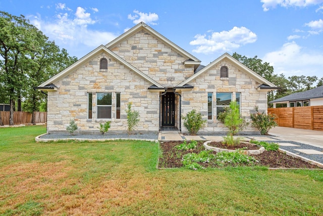 craftsman-style home with a front yard