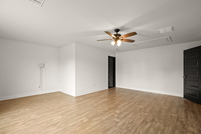 spare room with ceiling fan and light hardwood / wood-style flooring