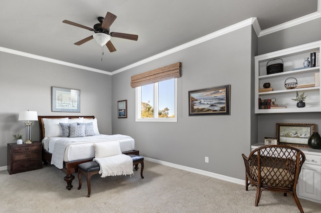 carpeted bedroom featuring ceiling fan and ornamental molding