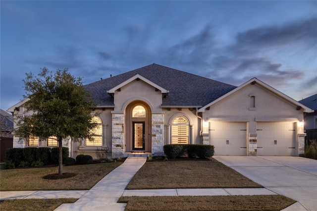 view of front of property with a garage