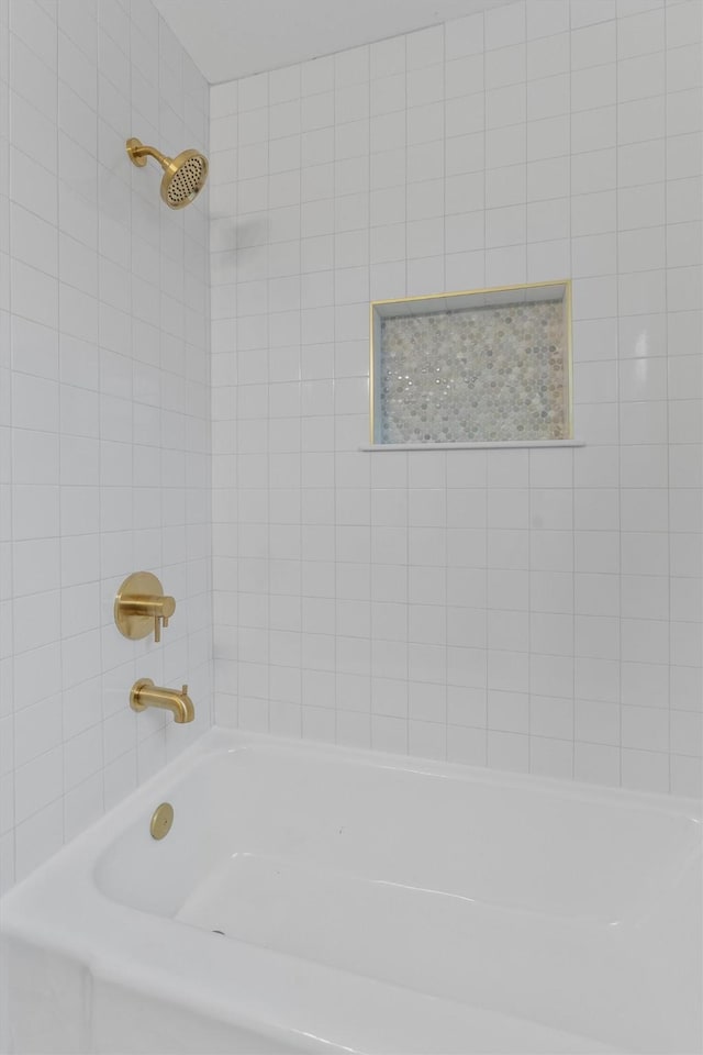 bathroom with shower / bathing tub combination