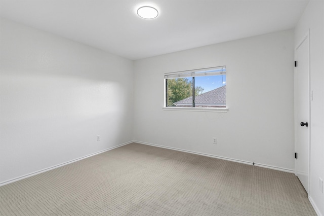 unfurnished room featuring carpet floors