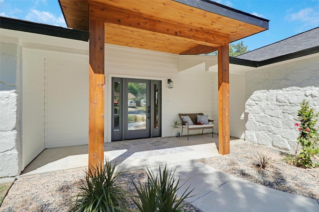 property entrance with a patio