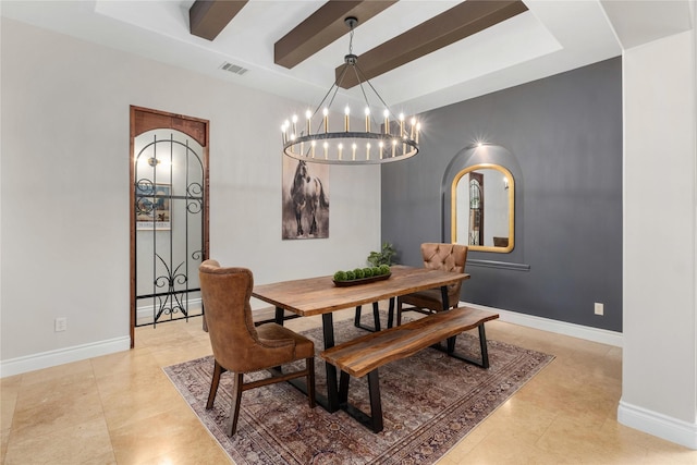 dining space with beam ceiling and a chandelier