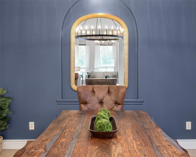 dining area featuring a chandelier