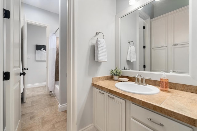 bathroom with vanity and shower / tub combo