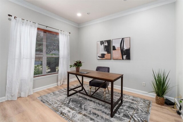home office featuring ornamental molding, light wood-style floors, baseboards, and recessed lighting