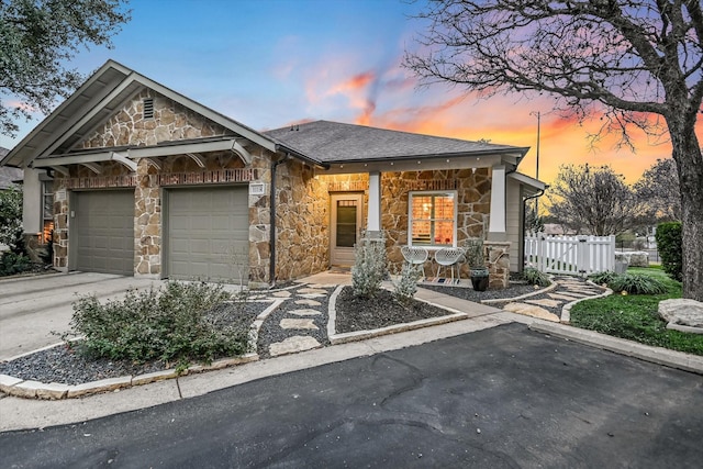 view of front of home with a garage