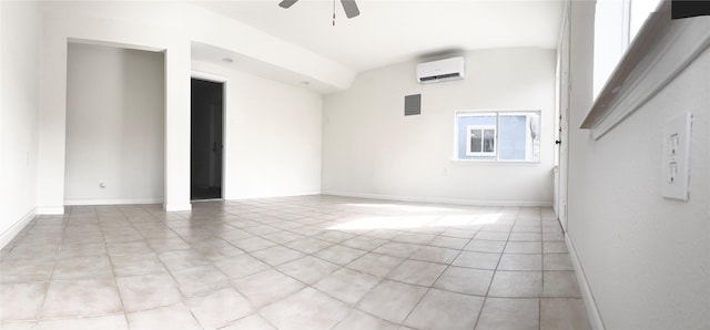 unfurnished room featuring ceiling fan, a wall mounted AC, and lofted ceiling