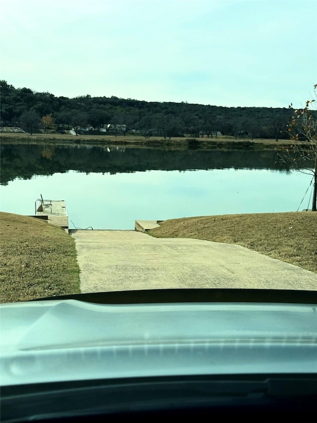 view of property's community with a water view