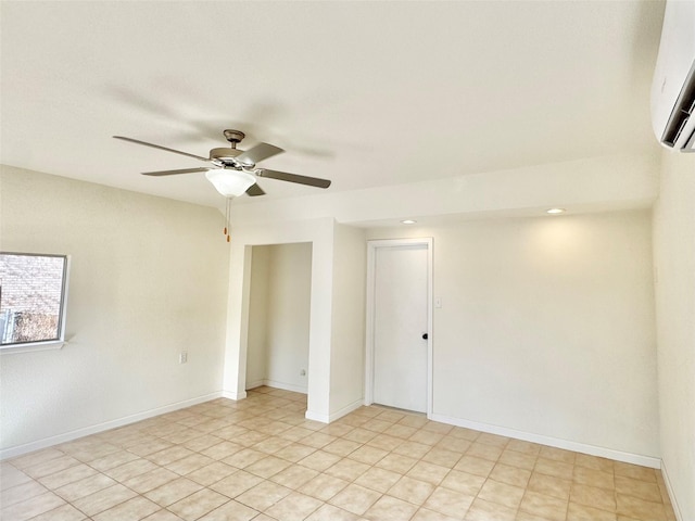 unfurnished room featuring ceiling fan and a wall unit AC