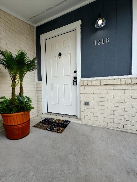1206 Hackberry Dr, Marble Falls, TX 78654 - entrance to property featuring covered porch