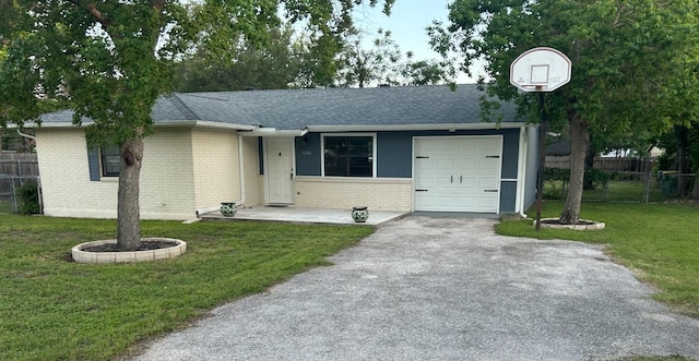 1206 Hackberry Dr, Marble Falls, TX 78654 - ranch-style home featuring driveway, brick siding, roof with shingles, and a garage