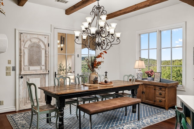 dining space with beam ceiling, dark hardwood / wood-style flooring, and a chandelier