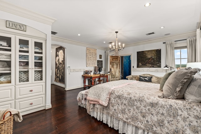 bedroom with dark hardwood / wood-style flooring, ornamental molding, and a chandelier