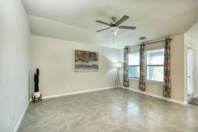 spare room featuring ceiling fan