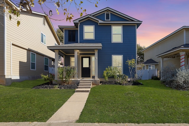 view of front of house featuring a lawn