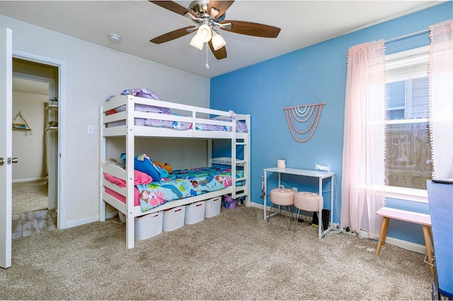 bedroom with ceiling fan and carpet