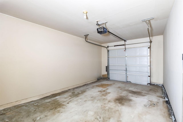 garage featuring a garage door opener