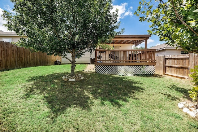 view of yard with a deck