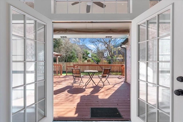 10113 Planters Woods Dr, Austin, TX 78730 - entryway featuring ceiling fan, plenty of natural light, and wood finished floors
