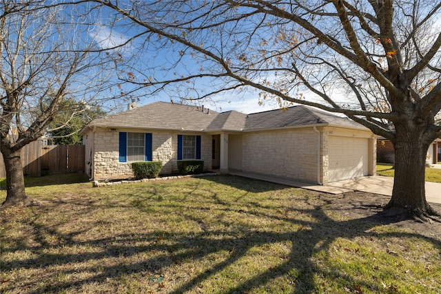 ranch-style house with a garage and a front lawn