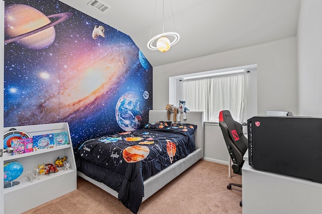 bedroom with carpet and lofted ceiling