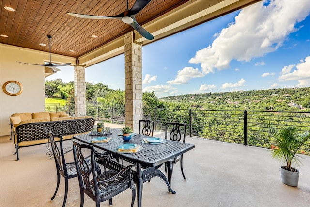 view of patio featuring ceiling fan and outdoor lounge area