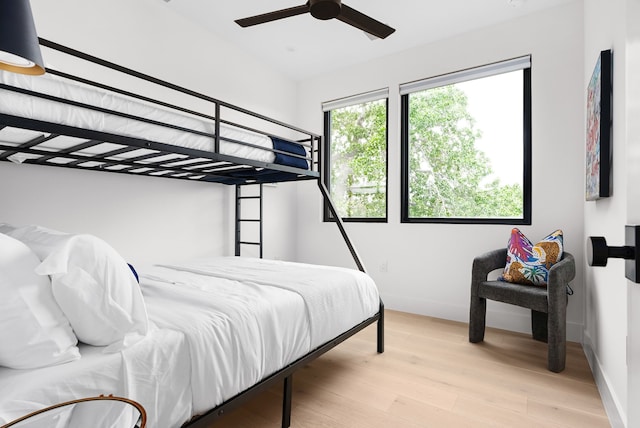 bedroom featuring ceiling fan and light hardwood / wood-style floors