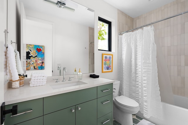 full bathroom featuring toilet, vanity, and shower / bath combo with shower curtain