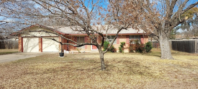 ranch-style house with a garage and a front lawn