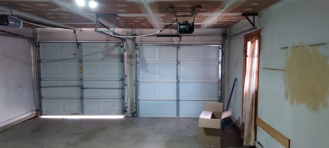 garage featuring a garage door opener