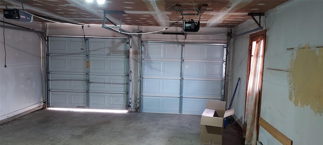 garage featuring a garage door opener