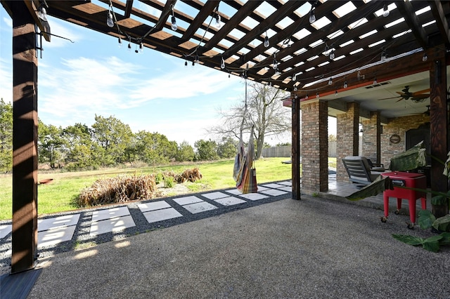 view of patio featuring ceiling fan and a pergola