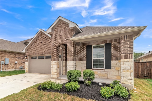 view of front of house with a garage