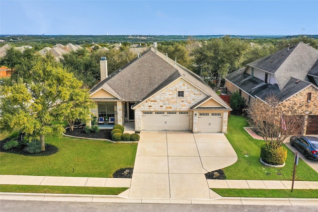 craftsman-style house featuring a garage and a front yard