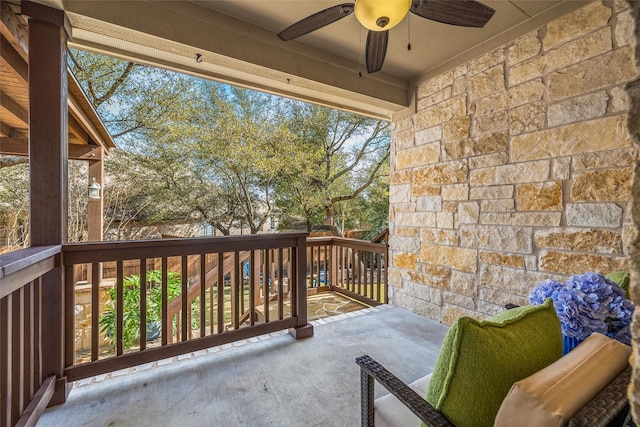 balcony featuring ceiling fan