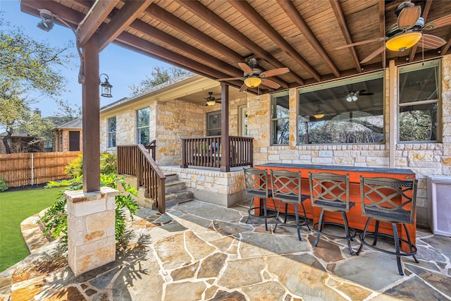 view of patio / terrace featuring exterior bar