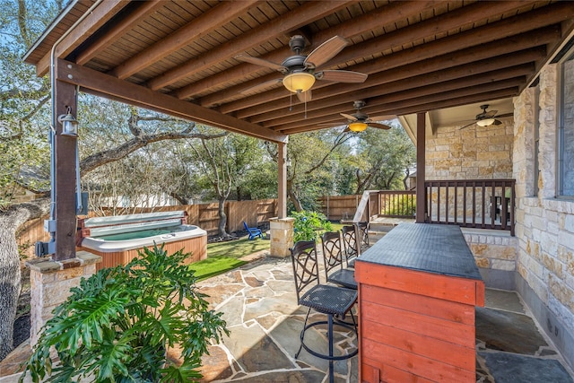 view of patio with a hot tub