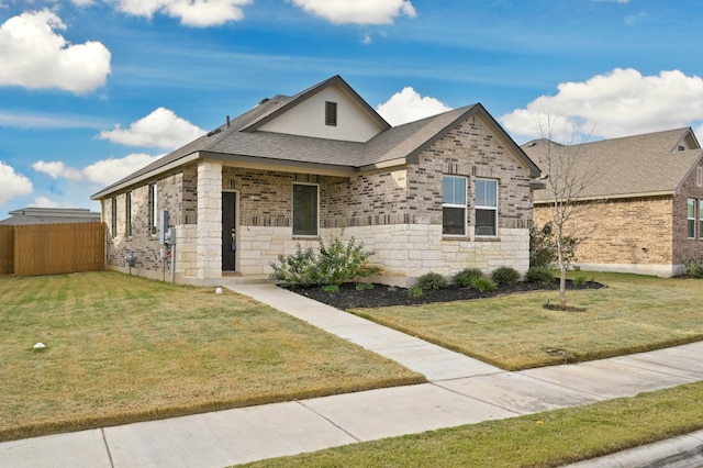 107 Dedina Dr, Georgetown, TX 78626 - view of front facade with brick siding and roof with shingles