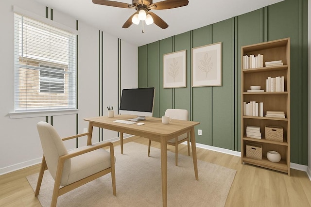 107 Dedina Dr, Georgetown, TX 78626 - office with a decorative wall, light wood-style flooring, ceiling fan, and healthy amount of natural light