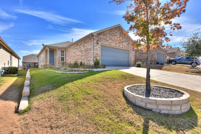 view of front of property with a garage and a front yard