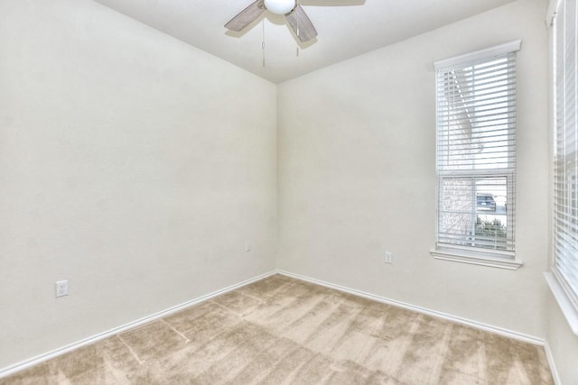 716 Kitty Hawk Rd, Georgetown, TX 78633 - carpeted empty room with a ceiling fan and baseboards