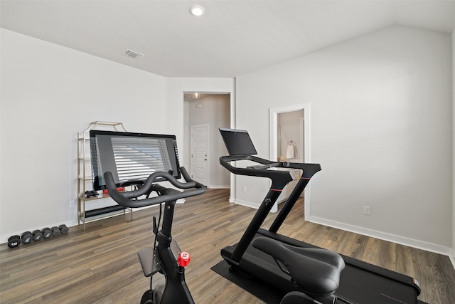 exercise area with dark hardwood / wood-style floors