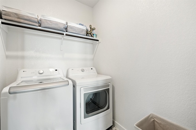 washroom featuring separate washer and dryer