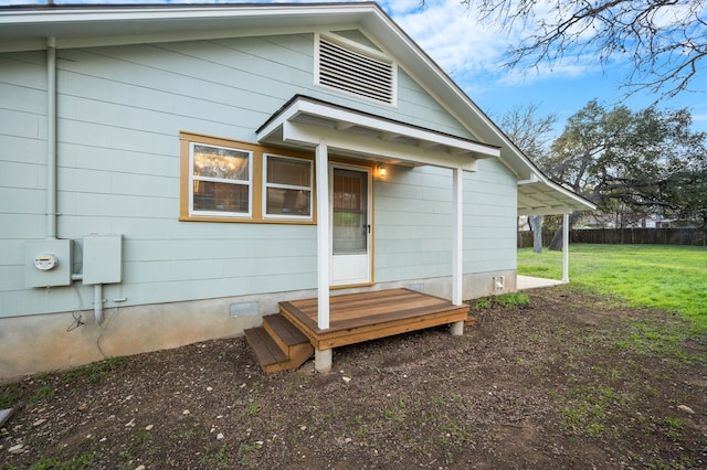 back of house featuring a yard